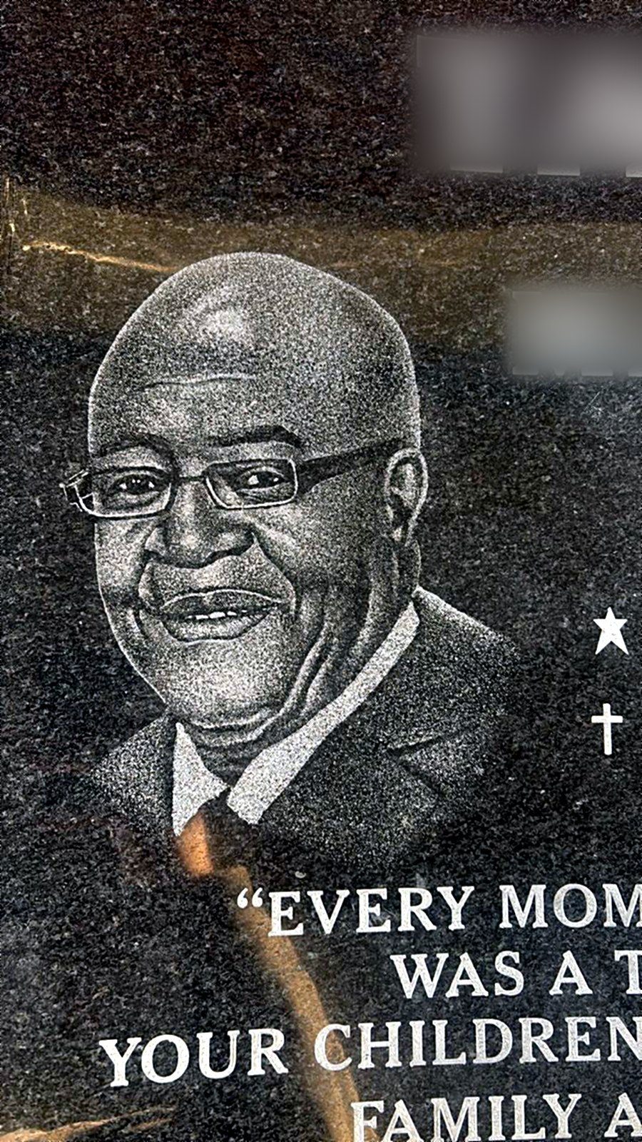 Finished hand-etched portrait on black granite